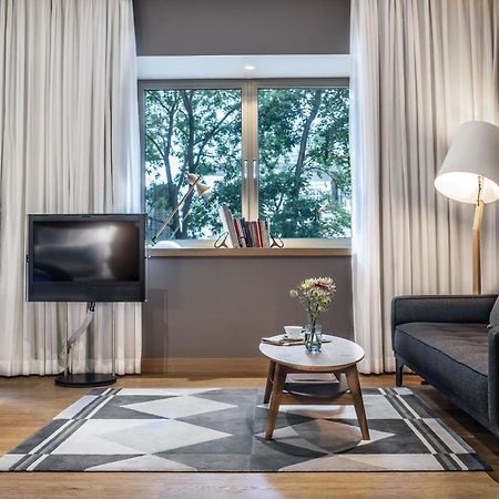 The Guesthouse Wien Exteriör bild A living room in a serviced apartment in Warsaw, Poland