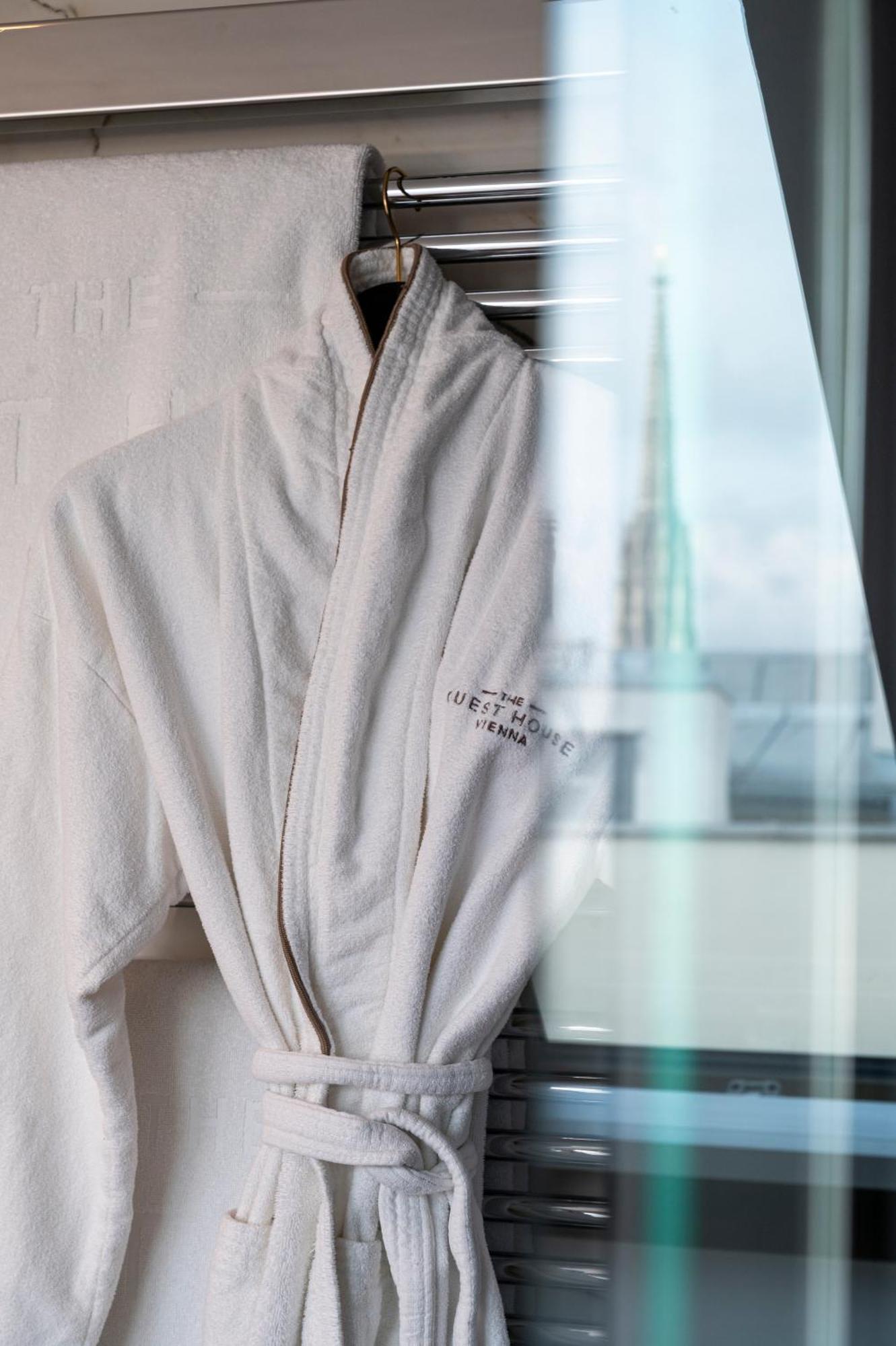 The Guesthouse Wien Exteriör bild A bathrobe